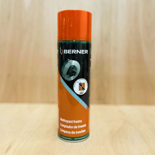 Spraying brake cleaner on a van’s caliper with 360° nozzle